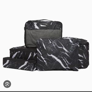 Calpak Black and White Garment Bags